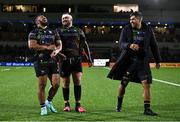 19 January 2024; Connacht players, from left, Bundee Aki, Jack Aungier and Jarrad Butler after their side's victory in the Investec Champions Cup Pool 1 Round 4 match between Connacht and Bristol Bears at the Dexcom Stadium in Galway. Photo by Seb Daly/Sportsfile