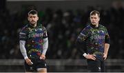 19 January 2024; Connacht players Jack Carty, right, and Tiernan O’Halloran during the Investec Champions Cup Pool 1 Round 4 match between Connacht and Bristol Bears at the Dexcom Stadium in Galway. Photo by Seb Daly/Sportsfile