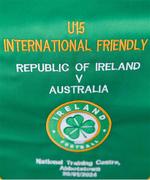 20 January 2024; A detailed view of a match pennant before the international friendly match between Republic of Ireland MU15 and Australia U16 Schoolboys at the FAI National Training Centre in Abbotstown, Dublin. Photo by Seb Daly/Sportsfile