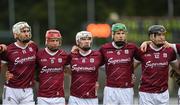 20 January 2024; Galway players, from left, Jason Flynn, Ronan Glennon, Donal O'Shea, Cianan Fahy, and John Cooney stand for the playing of Amhrán na bhFiann before the Dioralyte Walsh Cup semi-final match between Dublin and Galway at Parnell Park in Dublin. Photo by Stephen Marken/Sportsfile