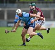 20 January 2024; Alex Considine of Dublin in action against Seán O'Hanlon of Galway during the Dioralyte Walsh Cup semi-final match between Dublin and Galway at Parnell Park in Dublin. Photo by Stephen Marken/Sportsfile