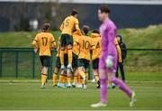 20 January 2024; Australia players celebrate their side's second goal, scored by Riley Zsuzsa, hidden, during the international friendly match between Republic of Ireland MU15 and Australia U16 Schoolboys at the FAI National Training Centre in Abbotstown, Dublin. Photo by Seb Daly/Sportsfile