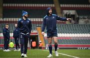 20 January 2024; Jamison Gibson-Park and Caelan Doris of Leinster walk the pitch before the Investec Champions Cup Pool 4 Round 4 match between Leicester Tigers and Leinster at Mattioli Woods Welford Road in Leicester, England. Photo by Harry Murphy/Sportsfile