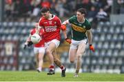 20 January 2024; Chris Og Jones of Cork in action against Cillian Burke of Kerry during the McGrath Cup final match between Kerry and Cork at Páirc Ui Rinn in Cork. Photo by Michael P Ryan/Sportsfile