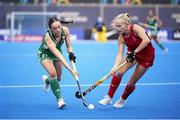 20 January 2024; Katie McKee of Ireland in action against Lily Walker of Great Britain during the FIH Women's Olympic Hockey Qualifying Tournament third/fourth place play-off match between Ireland and Great Britain at Campo de Hockey Hierba Tarongers in Valencia, Spain. Photo by Manuel Queimadelos/Sportsfile