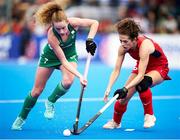 20 January 2024; Niamh Carey of Ireland in action against Anna Toman of Great Britain during the FIH Women's Olympic Hockey Qualifying Tournament third/fourth place play-off match between Ireland and Great Britain at Campo de Hockey Hierba Tarongers in Valencia, Spain. Photo by Manuel Queimadelos/Sportsfile