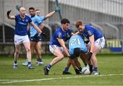 20 January 2024; Colm Basquel of Dublin in action against Oisín O'Toole, left, and Ryan Moffett of Longford during the Dioralyte O'Byrne Cup final match between Dublin and Longford at Laois Hire O'Moore Park in Portlaoise, Laois. Photo by Piaras Ó Mídheach/Sportsfile