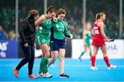 20 January 2024; Deirdre Duke of Ireland leaves the field after picking up an injury during the FIH Women's Olympic Hockey Qualifying Tournament third/fourth place play-off match between Ireland and Great Britain at Campo de Hockey Hierba Tarongers in Valencia, Spain. Photo by Manuel Queimadelos/Sportsfile