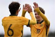 20 January 2024; Australia players Riley Zsuzsa, right, and Nicholas Badolato after their side's victory in the international friendly match between Republic of Ireland MU15 and Australia U16 Schoolboys at the FAI National Training Centre in Abbotstown, Dublin. Photo by Seb Daly/Sportsfile