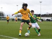 20 January 2024; Petera Love of Australia in action against Ryan Cunningham of Republic of Ireland during the international friendly match between Republic of Ireland MU15 and Australia U16 Schoolboys at the FAI National Training Centre in Abbotstown, Dublin. Photo by Seb Daly/Sportsfile