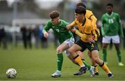 20 January 2024; Finn Duffy of Republic of Ireland in action against Lachlan McDonald of Australia during the international friendly match between Republic of Ireland MU15 and Australia U16 Schoolboys at the FAI National Training Centre in Abbotstown, Dublin. Photo by Seb Daly/Sportsfile