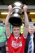 20 January 2024; Cork captain Sean Meehan lifts the McGrath cup after the McGrath Cup final match between Kerry and Cork at Páirc Ui Rinn in Cork. Photo by Michael P Ryan/Sportsfile
