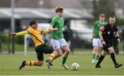 20 January 2024; Shea Callery of Republic of Ireland is tackled by Oliver Sacks of Australia during the international friendly match between Republic of Ireland MU15 and Australia U16 Schoolboys at the FAI National Training Centre in Abbotstown, Dublin. Photo by Seb Daly/Sportsfile