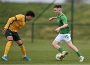 20 January 2024; Richard Ferizaj of Republic of Ireland in action against Nicholas Badolato of Australia during the international friendly match between Republic of Ireland MU15 and Australia U16 Schoolboys at the FAI National Training Centre in Abbotstown, Dublin. Photo by Seb Daly/Sportsfile