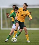 20 January 2024; Lachlan Henderson of Australia in action against Jason Spelman of Republic of Ireland during the international friendly match between Republic of Ireland MU15 and Australia U16 Schoolboys at the FAI National Training Centre in Abbotstown, Dublin. Photo by Seb Daly/Sportsfile