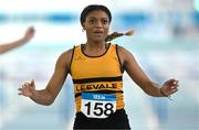 20 January 2024; Okwu Backari of Leevale AC, Cork, celebrates after finishing first in the U20 Women's 60m Hurdles heats during the 123.ie National Indoor U20 & U23s Athletics Championships at the TUS International Arena in Athlone, Westmeath. Photo by Tyler Miller/Sportsfile