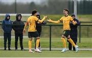 20 January 2024; Munib Smajic of Australia, right, celebrates with teammate Nicholas Badolato after scoring their side's third goal during the international friendly match between Republic of Ireland MU15 and Australia U16 Schoolboys at the FAI National Training Centre in Abbotstown, Dublin. Photo by Seb Daly/Sportsfile