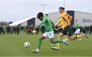 20 January 2024; David Dunne of Republic of Ireland in action against Lachlan Henderson of Australia during the international friendly match between Republic of Ireland MU15 and Australia U16 Schoolboys at the FAI National Training Centre in Abbotstown, Dublin. Photo by Seb Daly/Sportsfile