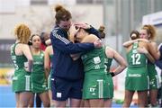 20 January 2024; Katie Mullan of Ireland is consoled after her side's defeat in the FIH Women's Olympic Hockey Qualifying Tournament third/fourth place play-off match between Ireland and Great Britain at Campo de Hockey Hierba Tarongers in Valencia, Spain. Photo by Manuel Queimadelos/Sportsfile