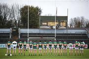 20 January 2024; Kerry players stand for the playing of the national anthem before the McGrath Cup final match between Kerry and Cork at Páirc Ui Rinn in Cork. Photo by Michael P Ryan/Sportsfile