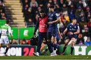 20 January 2024; Harry Byrne of Leinster leaves the field supported by Leinster team doctor Stuart O'Flanagan during the Investec Champions Cup Pool 4 Round 4 match between Leicester Tigers and Leinster at Mattioli Woods Welford Road in Leicester, England. Photo by Harry Murphy/Sportsfile