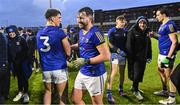20 January 2024; Longford players Oisín O'Toole, 3, and Mark Hughes after their side's victory in the Dioralyte O'Byrne Cup final match between Dublin and Longford at Laois Hire O'Moore Park in Portlaoise, Laois. Photo by Piaras Ó Mídheach/Sportsfile