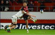 20 January 2024; Simon Zebo of Munster is tackled by Tom Pearson of Northampton Saints during the Investec Champions Cup Pool 3 Round 4 match between Munster and Northampton Saints at Thomond Park in Limerick. Photo by Brendan Moran/Sportsfile