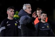 20 January 2024; Donegal manager Jim McGuinness speaks to his team, including Patrick McBrearty, left, and Ryan McHugh before the Bank of Ireland Dr McKenna Cup final match between Derry and Donegal at O'Neills Healy Park in Omagh, Tyrone. Photo by Ramsey Cardy/Sportsfile