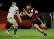 20 January 2024; Antoine Frisch of Munster in action against Ollie Sleightholme of Northampton Saints during the Investec Champions Cup Pool 3 Round 4 match between Munster and Northampton Saints at Thomond Park in Limerick. Photo by Brendan Moran/Sportsfile