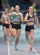 20 January 2024; Niamh Murray of Bray Runners AC, Wicklow, right, competes in the U20 Women's 400m during the 123.ie National Indoor U20 & U23s Athletics Championships at the TUS International Arena in Athlone, Westmeath. Photo by Tyler Miller/Sportsfile