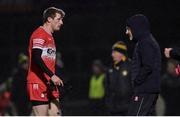 20 January 2024; Brendan Rogers of Derry speaks to Derry manager Mickey Harte after being shown a red card during the Bank of Ireland Dr McKenna Cup final match between Derry and Donegal at O'Neills Healy Park in Omagh, Tyrone. Photo by Ramsey Cardy/Sportsfile