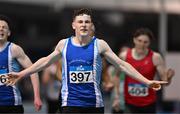 20 January 2024; David Mannion of South Galway AC, Galway, celebrates after finishing first in the U20 Men's 400m final during the 123.ie National Indoor U20 & U23s Athletics Championships at the TUS International Arena in Athlone, Westmeath. Photo by Tyler Miller/Sportsfile