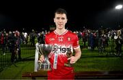 20 January 2024; Derry captain Shane McGuigan with the trophy and his player of the match award after the Bank of Ireland Dr McKenna Cup final match between Derry and Donegal at O'Neills Healy Park in Omagh, Tyrone. Photo by Ramsey Cardy/Sportsfile