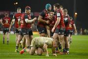 20 January 2024; Gavin Coombes of Munster is congratulated by teammates after scoring his side's third try during the Investec Champions Cup Pool 3 Round 4 match between Munster and Northampton Saints at Thomond Park in Limerick. Photo by Brendan Moran/Sportsfile