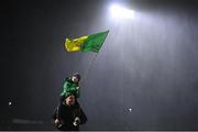 20 January 2024; Donegal supporters, Bobby, age 7, with his Dad Pascal, from Letterkenny, after the Bank of Ireland Dr McKenna Cup final match between Derry and Donegal at O'Neills Healy Park in Omagh, Tyrone. Photo by Ramsey Cardy/Sportsfile