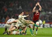 20 January 2024; Alex Mitchell of Northampton Saints in action against Alex Kendellen of Munster during the Investec Champions Cup Pool 3 Round 4 match between Munster and Northampton Saints at Thomond Park in Limerick. Photo by Brendan Moran/Sportsfile