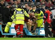 20 January 2024; Tom Ahern of Munster leaves the pitch on a stretcher during the Investec Champions Cup Pool 3 Round 4 match between Munster and Northampton Saints at Thomond Park in Limerick. Photo by Brendan Moran/Sportsfile