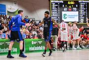 20 January 2024; UCC Demons players Seventh Woods, right, and Kyle Hosford celebrate during the Basketball Ireland Pat Duffy National Cup Final match between Irish Guide Dogs Ballincollig and UCC Demons at the National Basketball Arena in Tallaght, Dublin. Photo by Seb Daly/Sportsfile
