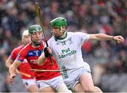 21 January 2024; Luke Hogan of O'Loughlin Gaels in action against Fintan Burke of St Thomas' during the AIB GAA Hurling All-Ireland Senior Club Championship Final match between O’Loughlin Gaels of Kilkenny and St. Thomas’ of Galway at Croke Park in Dublin. Photo by Ramsey Cardy/Sportsfile