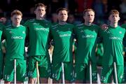 21 January 2024; Ireland players during the playing of the National Anthem before the FIH Men's Olympic Hockey Qualifying Tournament third/fourth place play-off match between Ireland and Korea at Campo de Hockey Hierba Tarongers in Valencia, Spain. Photo by David Ramirez/Sportsfile