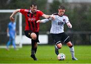 21 January 2024; Hayden Muller of Dundalk in action against Stephen Cleary of Malahide United AFC during the PTSB Leinster Senior Cup Group A match between Malahide United and Dundalk at Gannon Park in Malahide, Dublin. Photo by Tyler Miller/Sportsfile