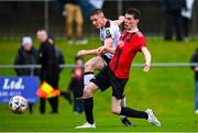 21 January 2024; Cameron Elliot of Dundalk in action against Thomas Lynch of Malahide United AFC during the PTSB Leinster Senior Cup Group A match between Malahide United and Dundalk at Gannon Park in Malahide, Dublin. Photo by Tyler Miller/Sportsfile
