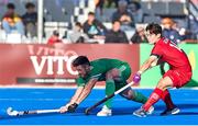 21 January 2024; Shane O'Donoghue of Ireland in action against Cheoleon Park of Korea during the FIH Men's Olympic Hockey Qualifying Tournament third/fourth place play-off match between Ireland and Korea at Campo de Hockey Hierba Tarongers in Valencia, Spain. Photo by David Ramirez/Sportsfile