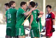 21 January 2024; Matthew Nelson of Ireland, right, celebrates with teammates after scoring his side's first goal during the FIH Men's Olympic Hockey Qualifying Tournament third/fourth place play-off match between Ireland and Korea at Campo de Hockey Hierba Tarongers in Valencia, Spain. Photo by David Ramirez/Sportsfile
