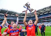 21 January 2024; Fintan Burke of St Thomas' and teammates celebrate with the Tommy Moore Cup after his side's victory in the AIB GAA Hurling All-Ireland Senior Club Championship Final match between O’Loughlin Gaels of Kilkenny and St Thomas’ of Galway at Croke Park in Dublin. Photo by Piaras Ó Mídheach/Sportsfile