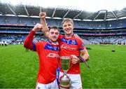 21 January 2024; Damien McGlynn and Fintan Burke of St Thomas' with the Tommy Moore Cup after their side's victory in the AIB GAA Hurling All-Ireland Senior Club Championship Final match between O’Loughlin Gaels of Kilkenny and St Thomas’ of Galway at Croke Park in Dublin. Photo by Piaras Ó Mídheach/Sportsfile