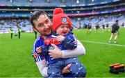 21 January 2024; St Thomas' goalkeeper Gerald Kelly with his daughter Éada, aged one and a half, after his side's victory in  the AIB GAA Hurling All-Ireland Senior Club Championship Final match between O’Loughlin Gaels of Kilkenny and St Thomas’ of Galway at Croke Park in Dublin. Photo by Piaras Ó Mídheach/Sportsfile
