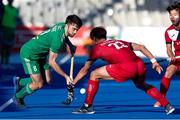21 January 2024; John McKee of Ireland in action against Hyeongjin Kim of Korea during the FIH Men's Olympic Hockey Qualifying Tournament third/fourth place play-off match between Ireland and Korea at Campo de Hockey Hierba Tarongers in Valencia, Spain. Photo by David Ramirez/Sportsfile