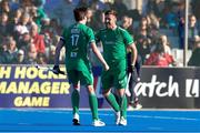 21 January 2024; Shane O'Donoghue of Ireland, right, celebrates with teammate Sean Murray after scoring his side's fourth goal during the FIH Men's Olympic Hockey Qualifying Tournament third/fourth place play-off match between Ireland and Korea at Campo de Hockey Hierba Tarongers in Valencia, Spain. Photo by David Ramirez/Sportsfile