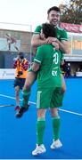 21 January 2024; John McKee and Daragh Walsh of Ireland celebrate after the FIH Men's Olympic Hockey Qualifying Tournament third/fourth place play-off match between Ireland and Korea at Campo de Hockey Hierba Tarongers in Valencia, Spain. Photo by David Ramirez/Sportsfile